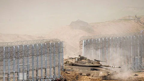 ISRAELI soldiers drive a tank as they cross the border from inside Gaza Strip into southern Israel, Tuesday, Feb. 13, 2024. The army is battling Palestinian militants across Gaza in the war ignited by Hamas’ Oct. 7 attack into Israel.
