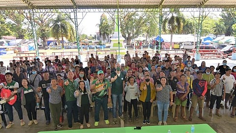 CASH AID. Negros Occ. Gov. Bong Lacson leads the distribution of the total P1.3 million financial assistance to swine producers in the towns of San Enrique, Valladolid, and Hinigaran affected by transboundary diseases, Feb. 13.