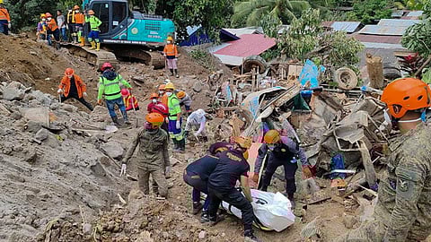 DAVAO DE ORO. In this February 9, 2024 handout photo from Municipality of Monkayo, rescuers recover bodies at the landslide-hit village of Maco in Davao de Oro province, southern Philippines.
