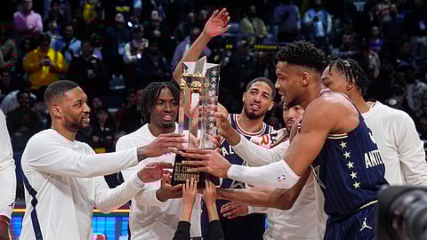 The East team, led by captain Milwaukee Bucks forward Giannis Antetokounmpo, right, hoists the trophy after defeating the West 211-186 in the NBA All-Star basketball game in Indianapolis, Sunday, Feb. 18, 2024 (Monday, Feb. 19, PH time).