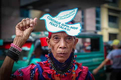 FIST FOR FIGHTING. Bai Licayan Bibyaon Bingkay, the lone woman datu who hails from the mountains of Talaingod in Davao del Norte, marched the streets of the city as she calls for the resumption of Peace Talks between the government and the New People’s Army (NPA). FIle photo was taken in 2017.