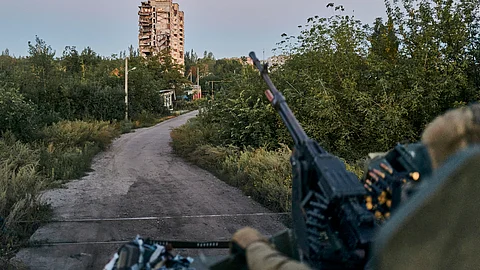 A Ukrainian soldier sits in his position in Avdiivka, Donetsk region, Ukraine, on Aug. 18, 2023. Ukrainian troops are under intense pressure from a determined Russian effort to storm the strategically important eastern Ukraine city of Avdiivka, officials say. Kyiv’s army is struggling with ammunition shortages as the Kremlin’s forces pursue a battlefield triumph around the two-year anniversary of Moscow’s full-scale invasion and ahead of a March presidential election in Russia.