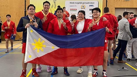 DUTCH OPEN MEDALISTS. From left, Davao City’s Paolo Tancontion and son Chino, playing head coach Ace Larida, and Sydney Sy Tancontian, and Marinduque native Aislinn Agnes Yap show off their medal haul of three golds, one silver, and one bronze at the Dutch Open 2024 International Sambo Tournament held in the Netherlands on Sunday, Philippine time. Siblings Chino and Sydney, and Larida each won a gold, while Paolo got a silver, and Yap with a bronze.