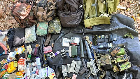 ILOILO. Military recovered materials from a raid, including various weapons, ammunition, communication devices, explosives, and subversive documents, on March 4, 2024.