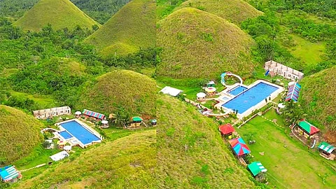 Ombudsman suspends Bohol guv, 68 others over Chocolate Hills resort