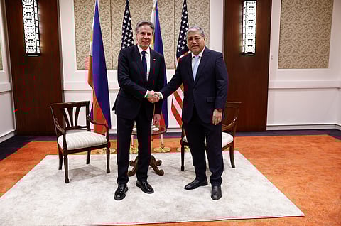 U.S. Secretary of State Antony Blinken, left, shakes hands with Philippines' Secretary of Foreign Affairs Enrique Manalo at the Sofitel Hotel in Manila, Philippines Tuesday, March 19, 2024.