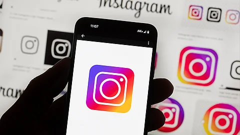 USA. The Instagram logo is seen on a cell phone in Boston, USA, October 14, 2022. Users of Meta's Facebook, Instagram, Threads and Messenger platforms are experiencing login issues in what appears to be a widespread outage.