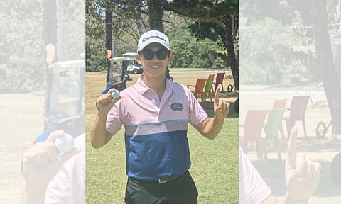 HOLE-IN-ONE. Enzo Magno of Rancho Palos Verdes Golf and Country Club shows off the Titleist No. 11 ball he used in acing the 185-yard sixth hole at Pueblo de Oro Golf and Country Club. He used a 6-iron for his first-ever hole-in-one. He played with Romeo Degolacion, Nilo Seno, and Hong Ky Kyang.