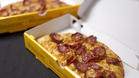 Yellow Cab holds best-ever pizza party; introduces Half Moon Pizzas