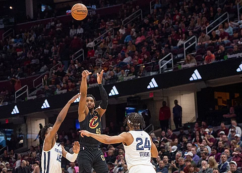 Memphis Grizzlies' Lamar Stevens (24) blocks Cleveland Cavaliers' Jarrett Allen during the first half of an NBA basketball game in Cleveland, Wednesday, April 10, 2024.