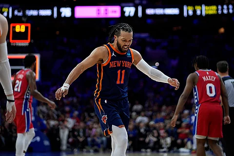 New York Knicks' Jalen Brunson grimaces as he walks off the court after the third quarter of Game 4 in an NBA basketball first-round playoff series against the Philadelphia 76ers, Sunday, April 28, 2024, in Philadelphia.