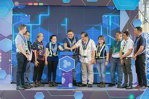 Switching On the Future: AboitizPower Thermal Business Group COO Ronaldo Ramos (Center) spearheads the switch-on ceremony of the Philippines’ and Southeast Asia’s first hybrid Battery Energy Storage System in a floating platform together with Province of Davao de Oro Governor Dorothy Gonzaga (left) and Municipality of Maco Mayor Voltaire Rimando (right)