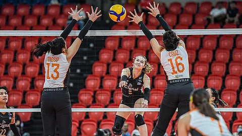 BEAUTY AND POWER: Cignal’s Vanie Gandler attacks the defense of Farm Fresh in their PVL game. / PVL