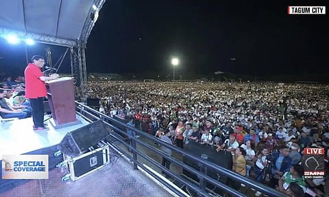 Aerial shot during the Hakbang ng Maisug prayer rally at the Davao del Norte Sports Complex in Tagum City on Sunday evening, April 14, 2024, attended by thousands of people within and outside the province. In this screenshot video, former President Rodrigo Duterte delivered his speech.