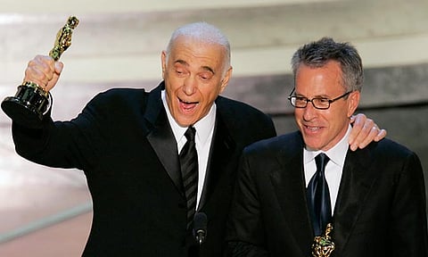 Producers Albert S. Ruddy, left, and Tom Rosenberg accept their Oscars after the film "Million Dollar Baby" won for best motion picture of the year at the 77th Academy Awards Sunday, Feb. 27, 2005, in Los Angeles. The Canadian-born producer and writer who won Oscars for “The Godfather” and “Million Dollar Baby,” died Saturday, May 25, 2024, at age 94.