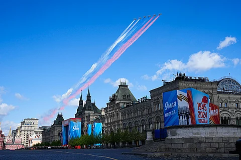 Russian military planes fly over Red Square leaving trails of smoke in colors of the national flag during the Victory Day military parade dress rehearsal at the Red Square in Moscow, Russia, Sunday, May 5, 2024. The parade will take place at Moscow's Red Square on May 9 to celebrate 79 years of the victory in WWII.