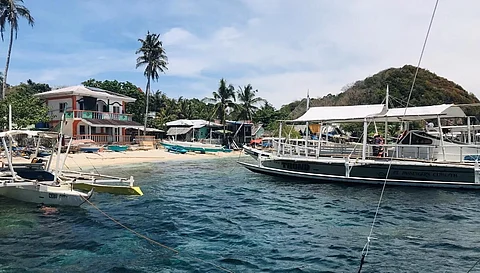 Where all the boats are docked, Apo Island