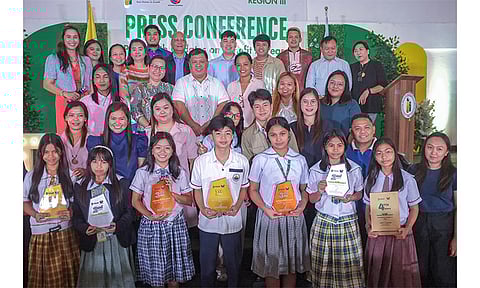 WINNERS. The winners in the regional reel-making and digital poster making contest of PhilHealth Central Luzon join officials during the awarding ceremonies and press conference in the City of San Fernando on June 7. (Contributed photo)