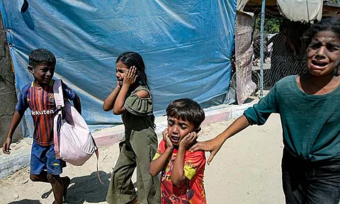 Palestinian children are evacuated from a site hit by an Israeli bombardment on Khan Younis, southern Gaza Strip, Saturday, July 13, 2024. Israel said it targeted Hamas' shadowy military commander in a massive strike Saturday in the crowded southern Gaza Strip that killed at least 71 people, according to local health officials. Hamas immediately rejected the claim that Mohammed Deif was targeted.