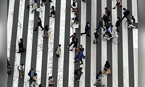Japan revises economic growth in 1Q downward