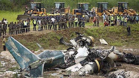 NEPAL. Nepal army personnel cordon off a plane crash site at Tribhuvan International Airport in Kathmandu, Nepal, Wednesday, July 24, 2024.