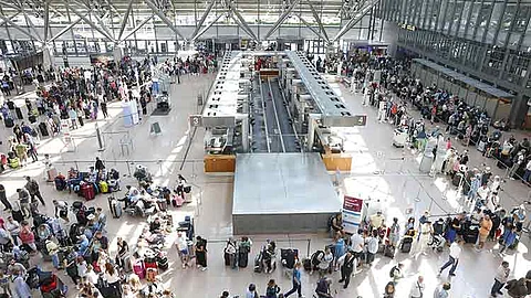 GERMANY. Travelers wait in Terminal 1 for check-in at Hamburg Airport, in Hamburg, Germany, Friday July 19, 2024. A widespread Microsoft outage disrupted flights, banks, media outlets and companies around the world on Friday, July 19, 2024.