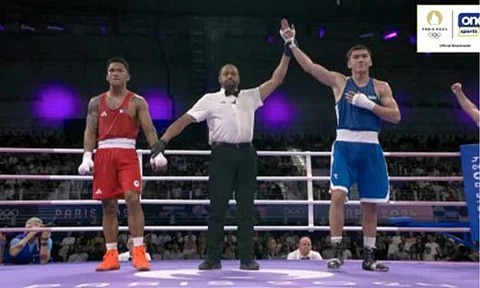 UPSET. Uzbekistan’s Turabek Khabibullaev (right) ousts the Philippines’ Eumir Felix Marcial via unanimous decision in the men's boxing 80kg round of 16 early Wednesday (July 31, 2024; PH time). Swimmer Kayla Sanchez followed him to the exit after failing to advance past the women’s 100m freestyle semifinals with a seventh-place finish in heat 2. (Screenshot via Go for Gold PH)