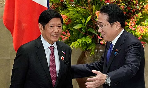 Japan's Prime Minister Fumio Kishida, right, greets Philippines' President Ferdinand Marcos Jr., prior to their bilateral meeting at the prime minister's official residence in Tokyo, Dec. 17, 2023. Japan and the Philippines are signing a key defense pact Monday, July 8, 2024, that would allow the deployment of Japanese forces for joint military exercises, including live-fire drills, to the Southeast Asian nation that came under brutal Japanese occupation in World War II but is now building an alliance with Tokyo as they face an increasingly assertive China.