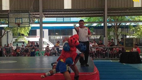 Central Visayas (Region VII) takes the win against Bicol Region (Region V), 2-0, in the Game 9 of the Palarong Pambansa 2024 Wushu Boys' Secondary 45kg category Thursday morning, July 11, 2024, at the University of Cebu - METC. | via Chrysler James I. Tundag, Junior Journalist and Dana Gracielle Quirante, UP Tacloban Intern.