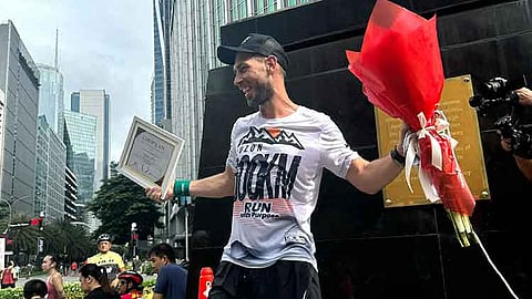 MANILA. Marko Kasic, British philanthropist and founder of FundLife, receives a special gift from Rockwell Run Club, the hosting partner for the final 21km of his 600 km journey.