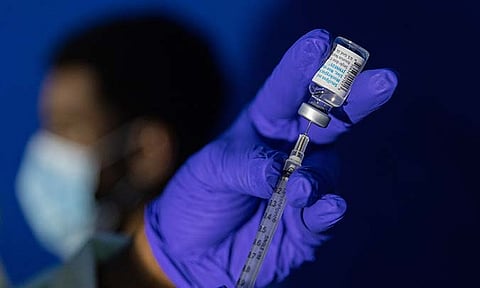 Family nurse practitioner Carol Ramsubhag-Carela prepares a syringe with the Mpox vaccine before inoculating a patient at a vaccinations site on, Aug. 30, 2022, in the Brooklyn borough of New York.