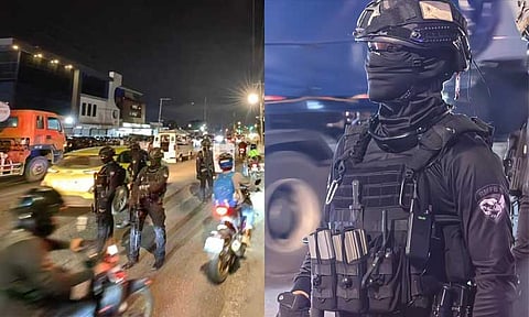 Police personnel manning a checkpoint in front of the Kingdom of Jesus Christ (KOJC) compound along Buhangin District in Davao City.