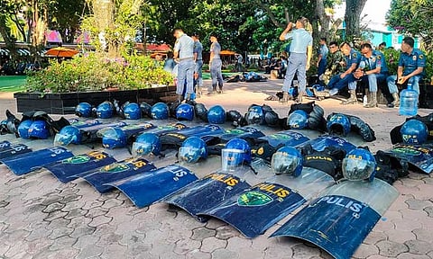 Police inside the Kingdom of Jesus Christ (KOJC) Compound were seen resting on Wednesday afternoon, August 28, 2024. The media were granted access to the KOJC compound for the first time. Police presence remains visible around the area as of writing.