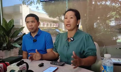 Kingdom of Jesus Christ (KOJC) missionary, Sister Genelyn Bingil (right), an alleged victim of human trafficking, was presented during a press conference at the KOJC Compound earlier today, Wednesday, August 28, 2024. She firmly denied the claims, speaking alongside KOJC legal counsel, Atty. Israelito Torreon.