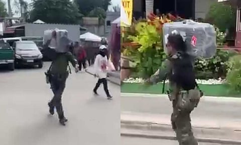 A member of the Kingdom of Jesus Christ (KOJC) captured a video allegedly showing the smuggling of three black boxes into the KOJC compound on Friday morning during a prayer gathering by the group's members. The boxes reportedly did not go through a scanner and were quickly brought inside the compound by the police.