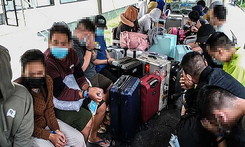 CHARGED. Some of the 169 foreign nationals, who were caught in an alleged Pogo raid at the Tourist Garden Hotel in Barangay Agus, Lapu-Lapu City on Aug. 31, 2024, were charged with human trafficking. /