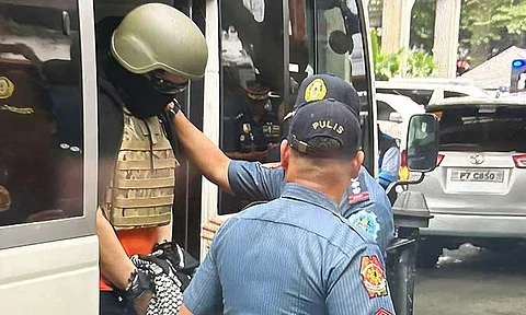 ON TRIAL. Wearing a Kevlar helmet and bulletproof vest, Kingdom of Jesus Christ leader Apollo Quiboloy arrived at the Pasig Regional Trial Court before 8 a.m. Friday, September 13, 2024, in connection with their arraignment on charges of qualified human trafficking. Quiboloy and his co-accused have pleaded not guilty to the qualified human trafficking charges filed against them.