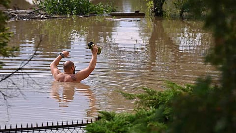 Death toll rises as flooding forces evacuations