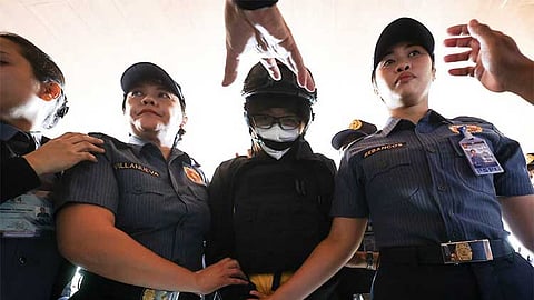 MANILA. Dismissed Bamban, Tarlac mayor Alice Guo is escorted to the Senate by law enforcers and members of the Senate Sergeant-at-Arms on Tuesday, September 17, 2024.