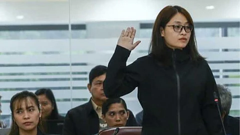 THE WHOLE TRUTH. Former mayor Alice Guo is placed under oath before the start of the House of Representatives quad committee hearing on illegal Philippine Offshore Gaming Operators at the Batasang Pambansa, Quezon City on Thursday (Sept. 19, 2024). She will be transferred to Camp Crame in Quezon City to the Pasig City Jail on Monday (Sept. 23). (PNA photo by Joan Bondoc)