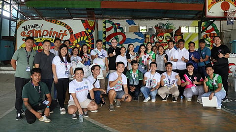 The volunteer CHMSU students and staff, Talisay Youth Organization with the Brgy. Sampinit officials during the goods distribution on October 3, 2024.