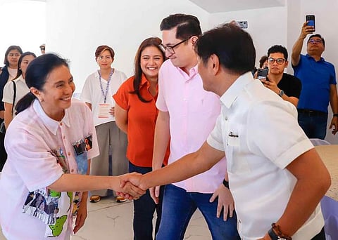SORSOGON. Former Vice President Leni Robredo greets President Ferdinand R. Marcos Jr. with former Senator Bam Aquino looking on, following Senate President Chiz Escudero’s invitation for her to attend the 130th founding anniversary of Sorsogon on October 17.