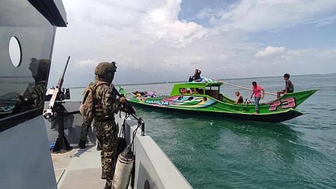 ZAMBOANGA. The Police Regional Office-Zamboanga Peninsula activates a Critical Incident Management Task Group (CIMTG) to focus on the investigation and swift resolution of the abduction of Elliot Onil Eastman in Barangay Poblacion, Sibuco, Zamboanga del Norte, on Thursday, October 17, 2024. A photo handout shows a policeman aboard a patrol craft stopped a motorboat for inspection as search for Eastman continued in the region. (SunStar Zamboanga)