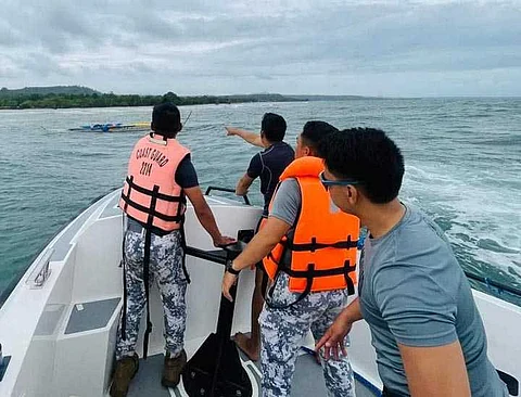 ZAMBOANGA. Personnel of the Coast Guard Station Isabela rescue two people near Lampinigan Island, Isabela City, Basilan province on Monday, October 21. Rescued were Junaid Maliki, 20, and Badad Maliki, 21, whose motorboat capsized while transporting drinking water from Lampinigan Island amid the inclement weather conditions.