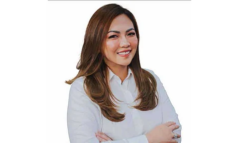Physician throws hat on board member race