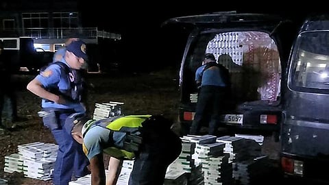ZAMBOANGA. Army troops in coordination with the police arrest two people and seize some P4 million worth of smuggled cigarettes in a checkpoint operation in Rebucon village, Nunungan, Lanao del Norte, on Friday, October 25, 2024. A photo handout shows the vehicles loaded with smuggled cigarettes were taken to the municipal police station of Nunungan for proper disposition. (Contributed)