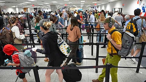 USA. Travelers line up for security clearance at Hartsfield-Jackson Atlanta International Airport on June 28, 2024, in Atlanta.