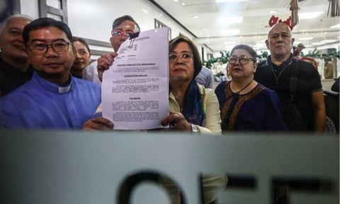 IMPEACHMENT COMPLAINT. A coalition of civil society leaders, sectoral representatives and advocates file an impeachment complaint against Vice President Sara Duterte in the House of Representatives on Monday (Dec. 2, 2024). They were accompanied by former senator Leila De Lima (holding complaint), who served as spokesperson. (PNA photo by Joan Bondoc)