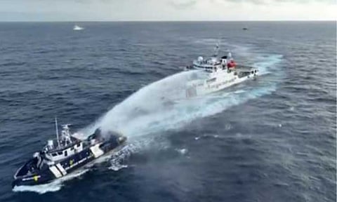 HARASSMENT. A CCG vessel bombards BRP Datu Pagbuaya with water cannon while the latter was on routine maritime patrol in the vicinity of Bajo de Masinloc on Wednesday morning, December 4, 2024. The Department of Foreign Affairs has formally lodged its protest against China’s latest aggression in the Bajo de Masinloc (Scarborough Shoal).