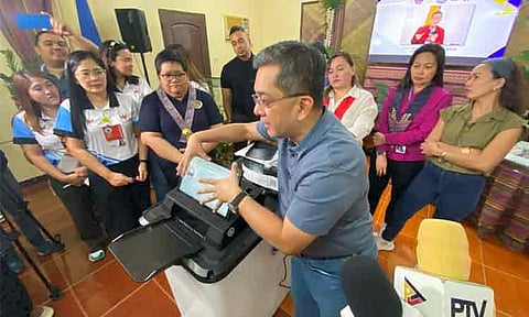 Commission on Elections (Comelec) Chairman George Erwin M. Garcia led the testing of the Automated Counting Machine (ACM) at Daniel R. Aguinaldo National High School on December 7, 2024.